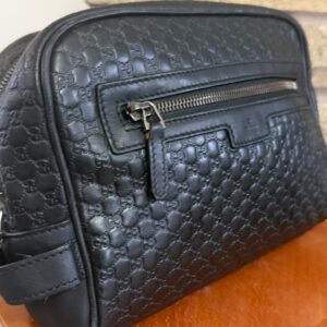 GUCCI GG MICROGUCCISSIMA LEATHER TOILETRY CASE