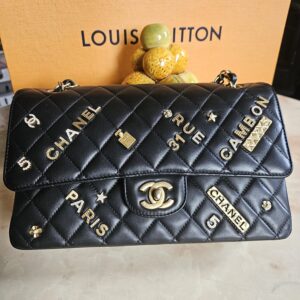 LIMITED EDITION CHANEL MEDIUM DOUBLE FLAP CHARMS BAG